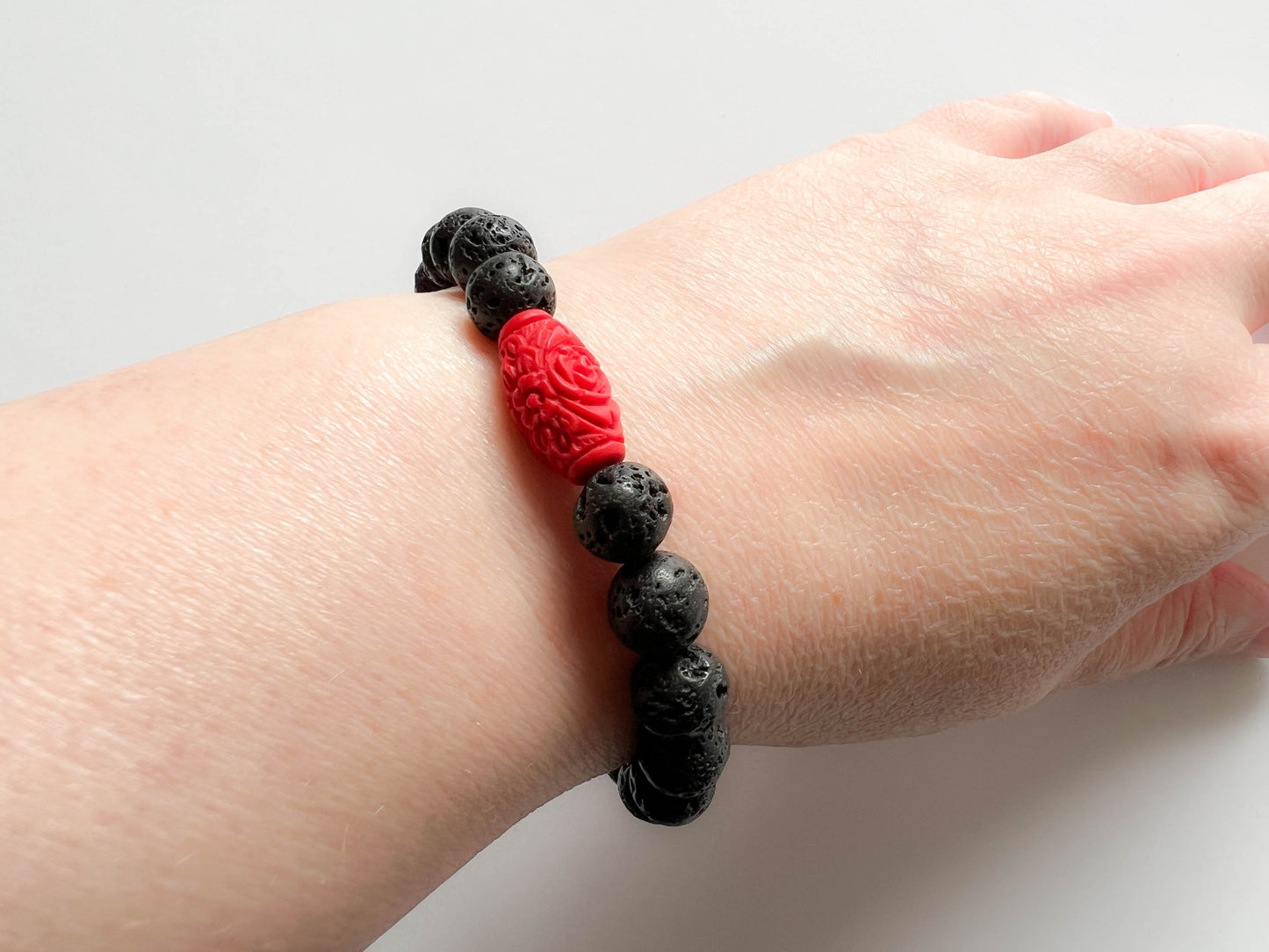 Black Lava stone and red flower bead bracelet - stretch - essential oil diffuser jewellery