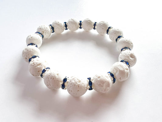 White Lava stone bead bracelet with blue rhinestones - stretch - essential oil diffuser jewellery